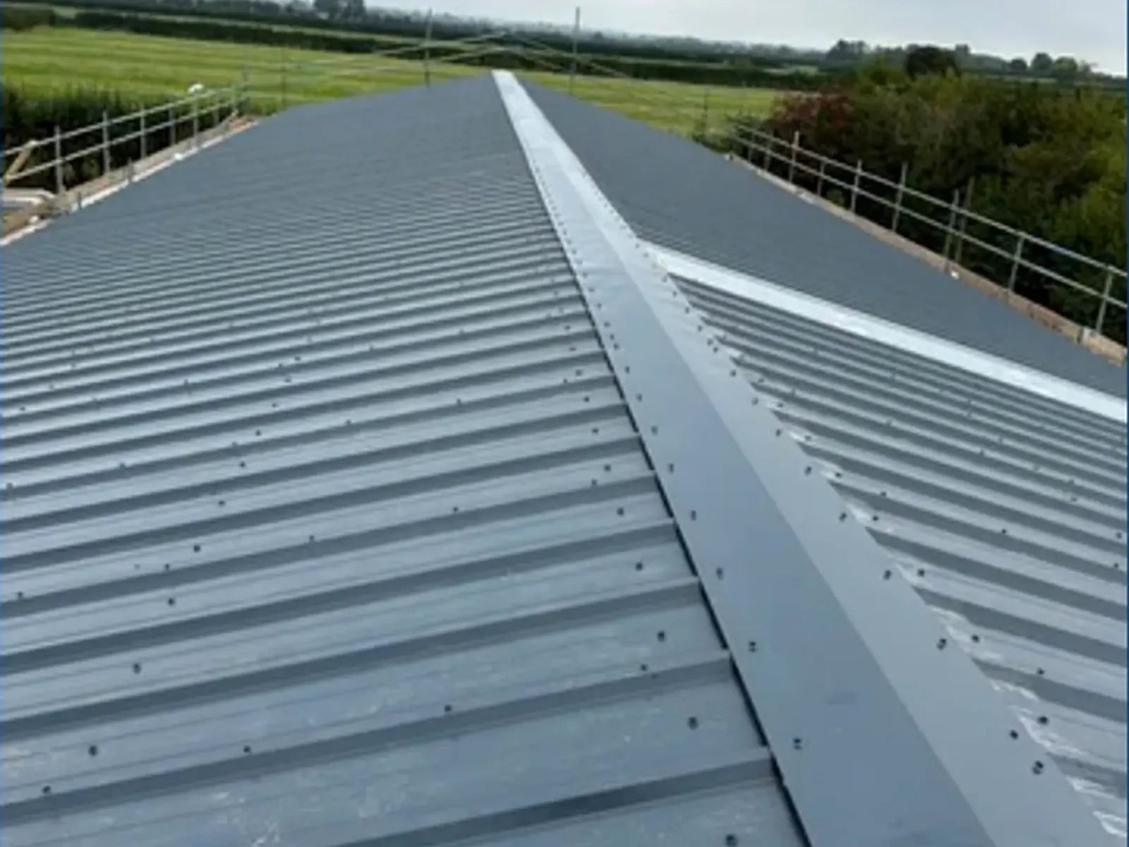 Completed sheet roof ridge